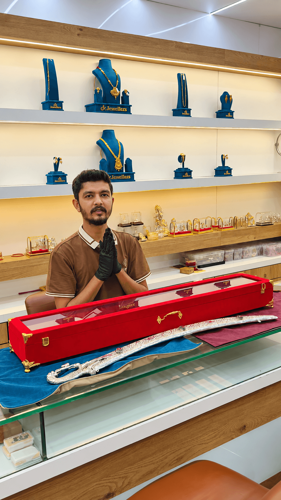 An artisan handcrafting jewellery at D K Jewellers